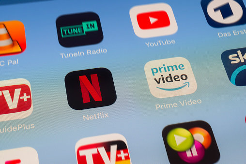 Netflix and Prime Video apps on an iPad screen.