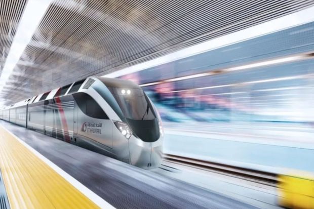 Illustration of a high-speed train moving through a station.