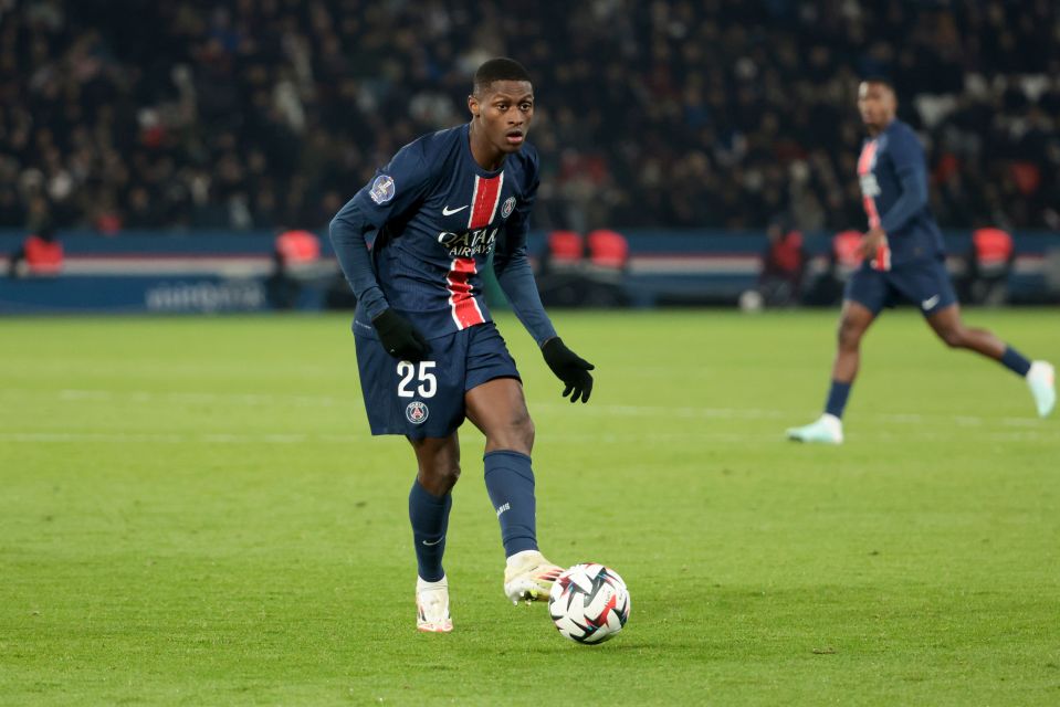 Nuno Mendes of PSG controls the ball during a Ligue 1 match.