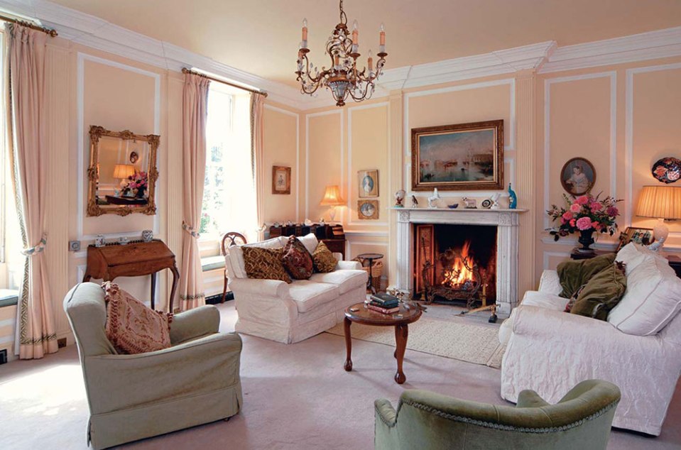 Living room with fireplace in Richard Hammond's Bollitree Castle.
