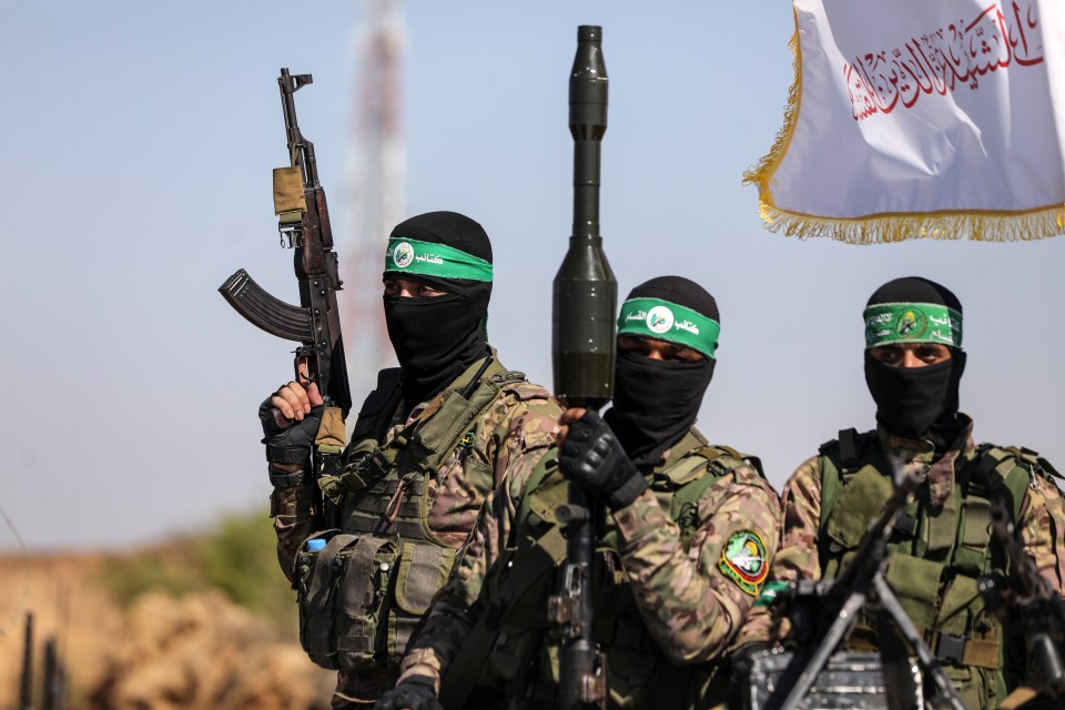 Hamas fighters in military parade.