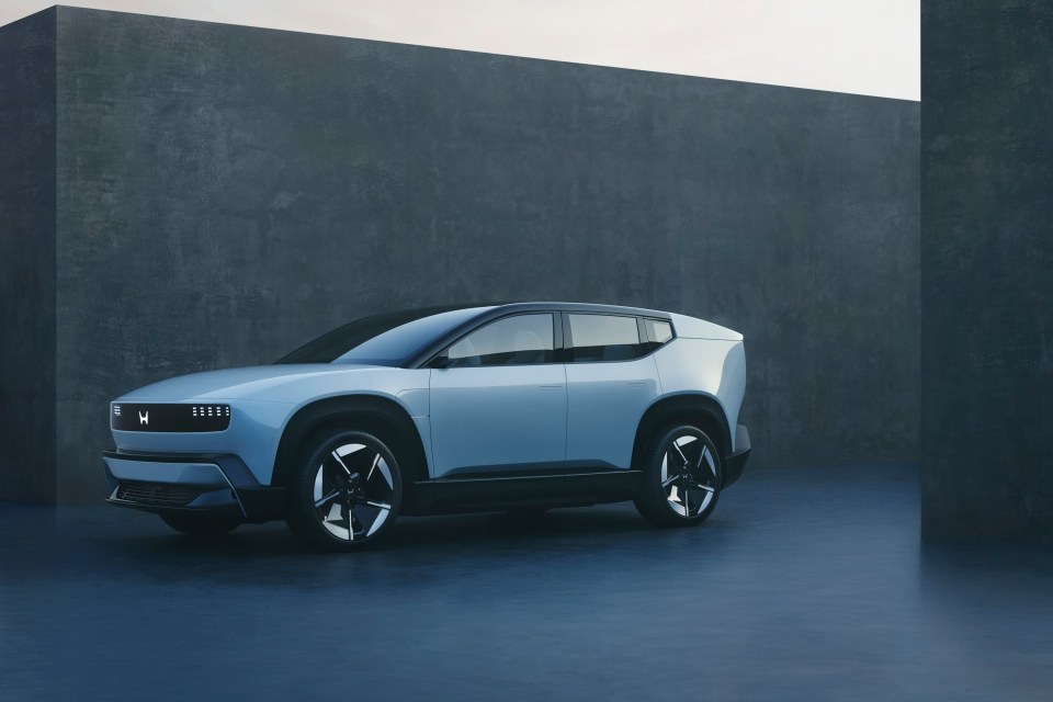 Light blue Honda SUV.