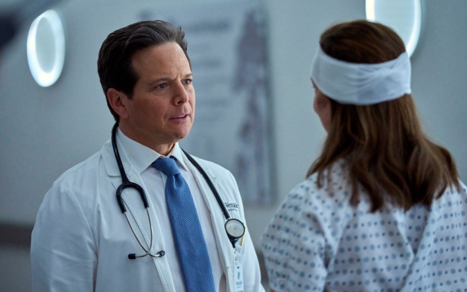 Doctor talking to patient.