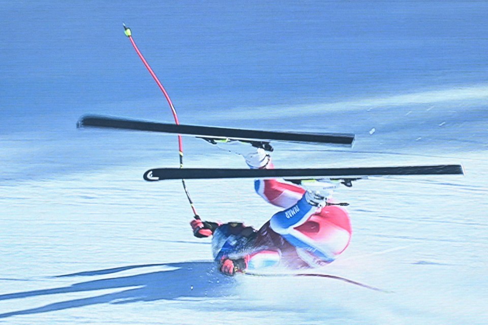 Screen grab of a skier crashing during a Super G race.