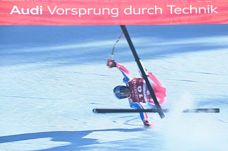 Screen grab of Alexis Pinturault crashing during a ski race.