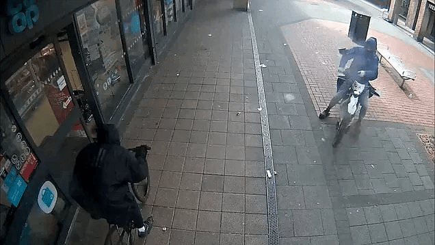 Security camera footage of a shooting.