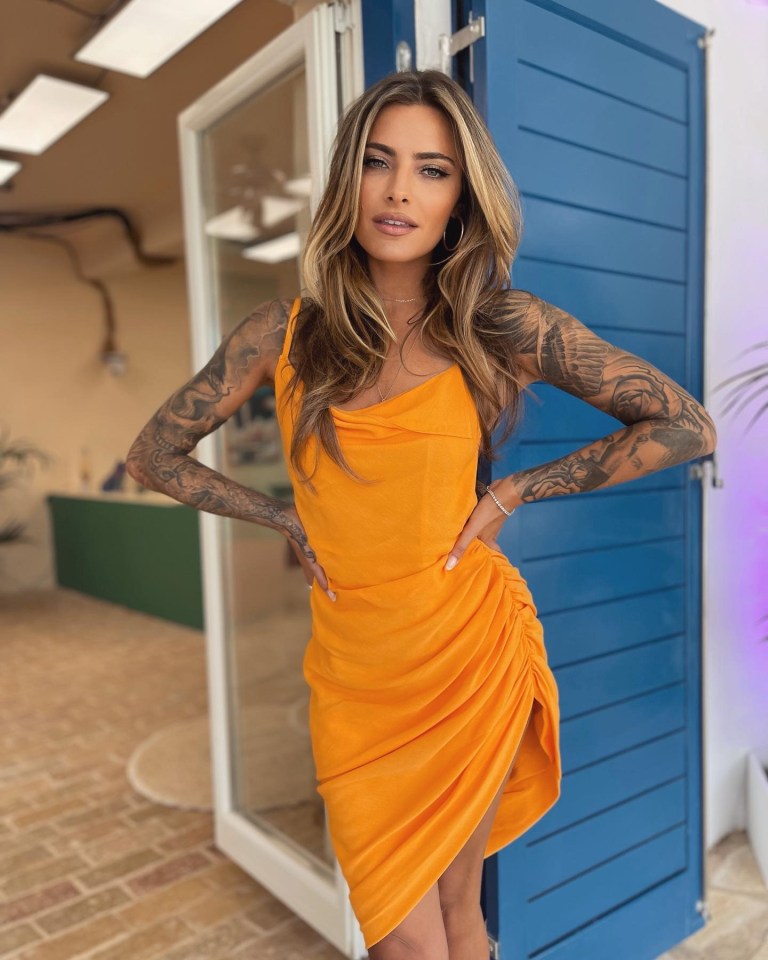 Sophia Thomalla in an orange dress.
