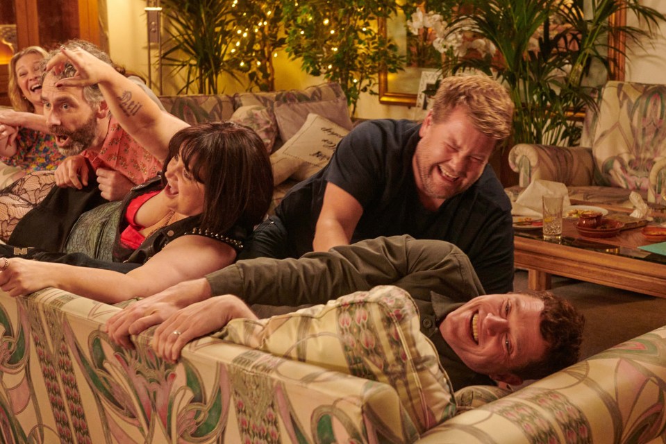 Still image from Gavin & Stacey: The Finale, showing the main cast playfully piled on a sofa.