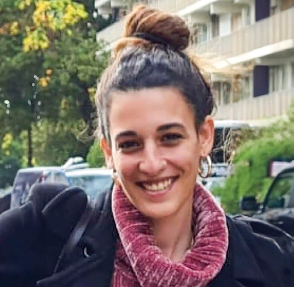 Woman smiling.
