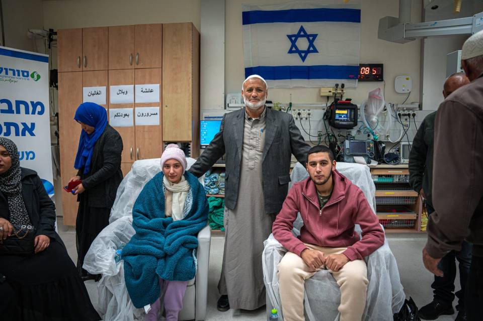 Aisha and Bilal Ziyadne reunited with their father after a hostage release.