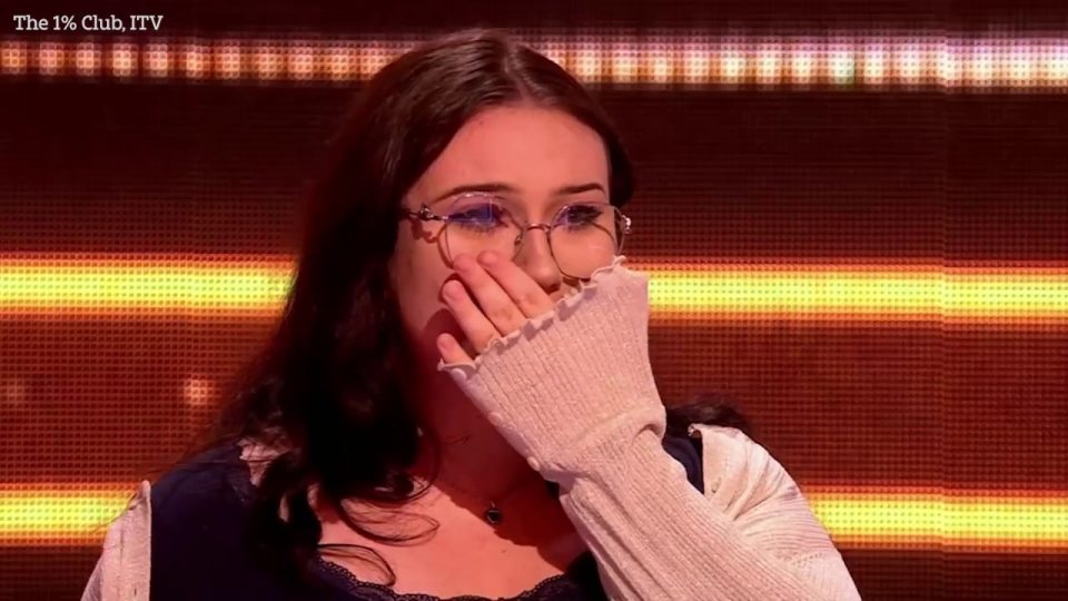 Woman crying on The 1% Club.