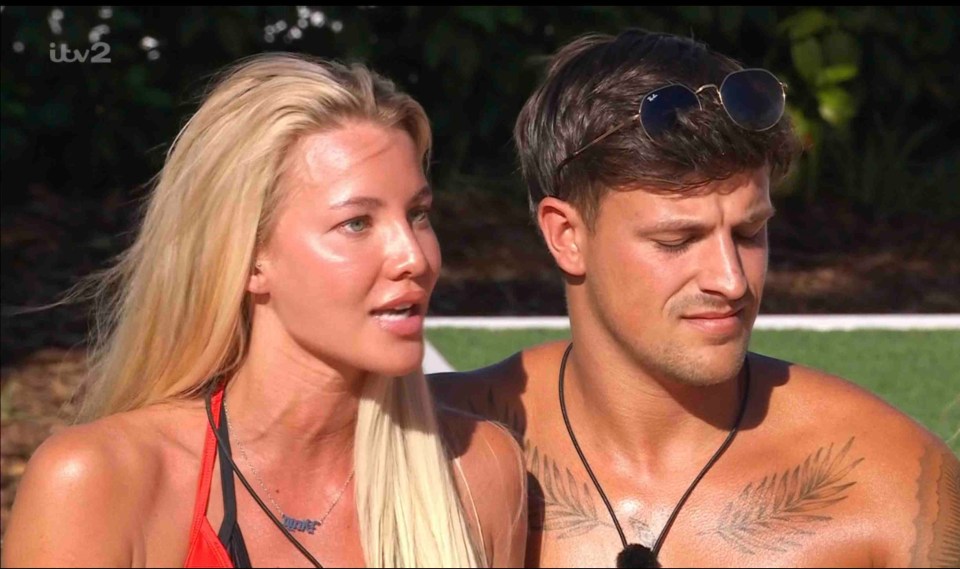 Olivia Hawkins and a male contestant on Love Island.