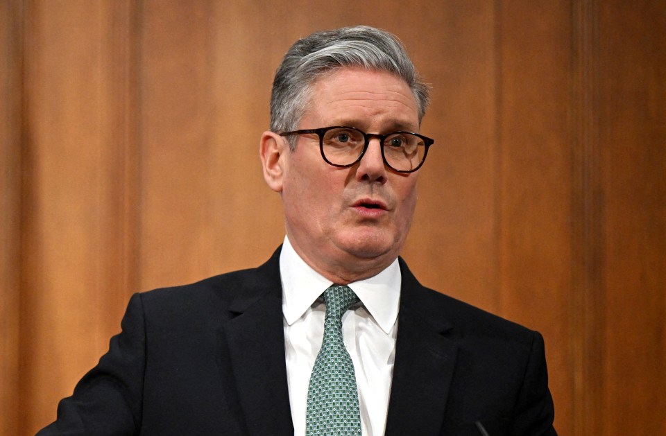 Prime Minister Keir Starmer speaking at a podium.