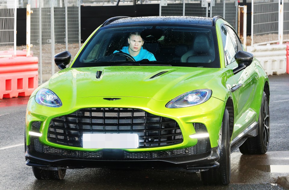 Erling Haaland in a lime green Aston Martin DBX 707.
