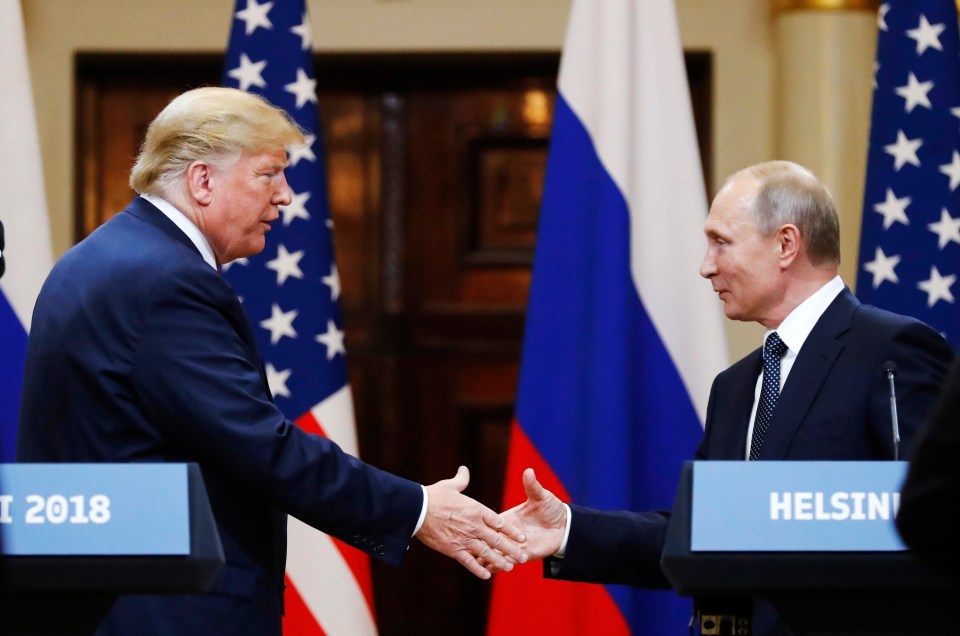 President Trump and President Putin shaking hands in Helsinki.