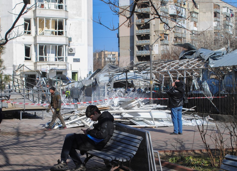 Damage to buildings and a market after a drone strike in Odesa, Ukraine.