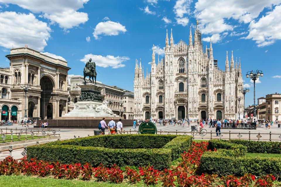 Milan's Piazza del Duomo with the Duomo, Galleria Vittorio Emanuele II, and equestrian statue.
