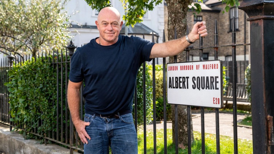 Ross Kemp at Albert Square sign.