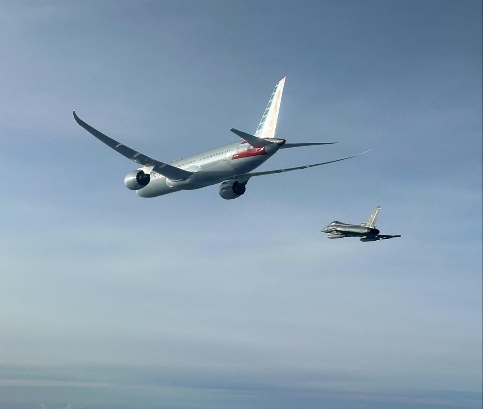 American Airlines flight escorted by Eurofighter jet.