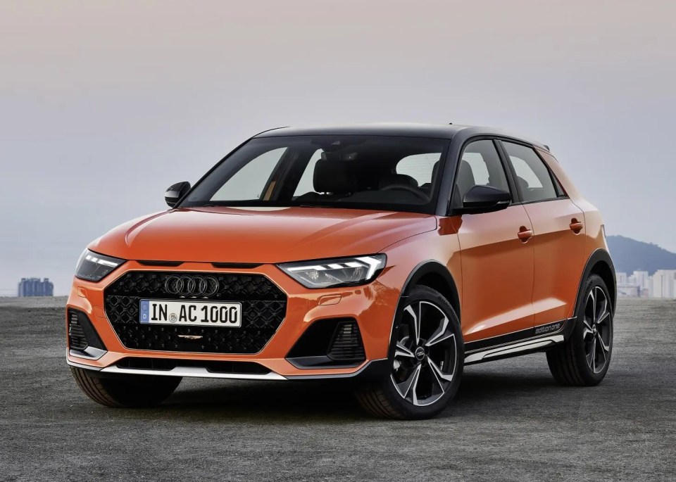 Orange Audi A1 Citycarver parked on a paved surface.