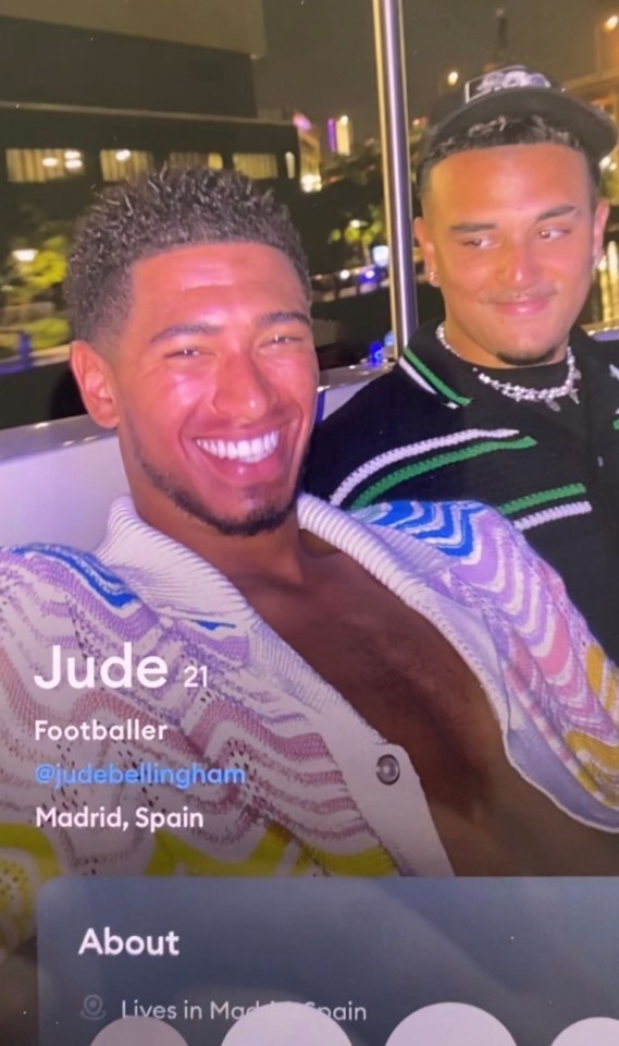 Jude Bellingham and another man smiling for a photo.