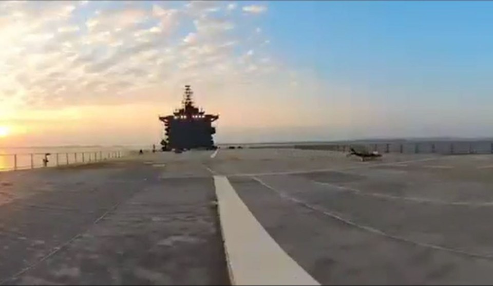 The Shahid Bakri drone carrier warship at sunset.