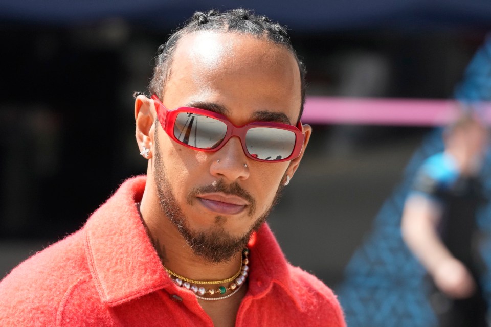 FILE - Mercedes driver Lewis Hamilton of Britain arrives at the Bahrain International Circuit in Sakhir, Bahrain, Thursday, March 2, 2023. (AP Photo/Frank Augstein, File)