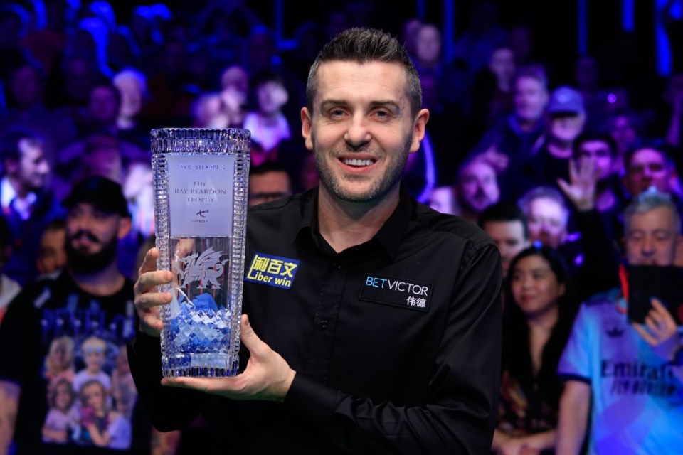 LLANDUDNO, WALES - FEBRUARY 16: Mark Selby of England poses with the champions trophy after winning the Final match against Stephen Maguire of Scotland on day seven of BetVictor Welsh Open 2025 at Venue Cymru on February 16, 2025 in Llandudno, Wales. (Photo by Tai Chengzhe/VCG via Getty Images)