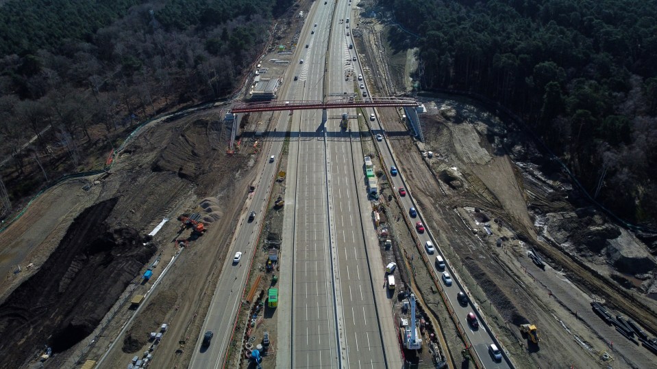 Aerial view of M25 motorway construction near Cobham.