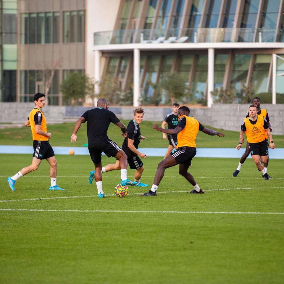 Arsenal soccer players training.