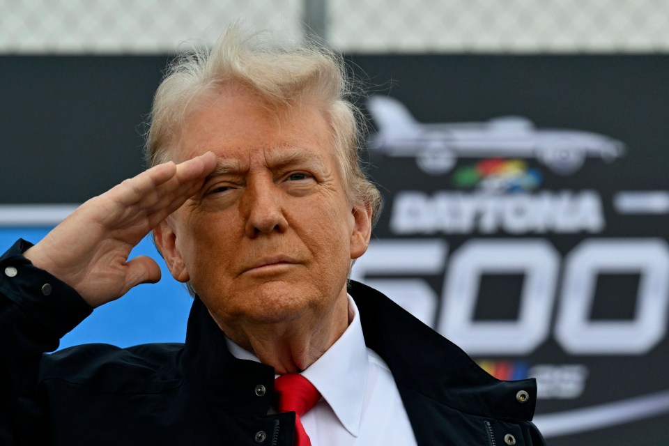 Donald Trump saluting at the Daytona 500.