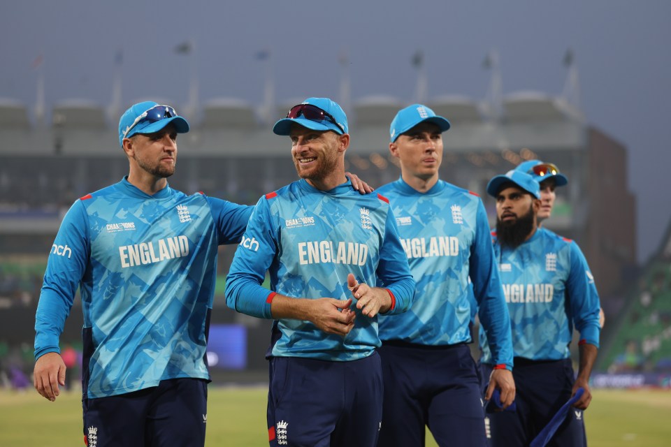 England cricket team players in blue uniforms.