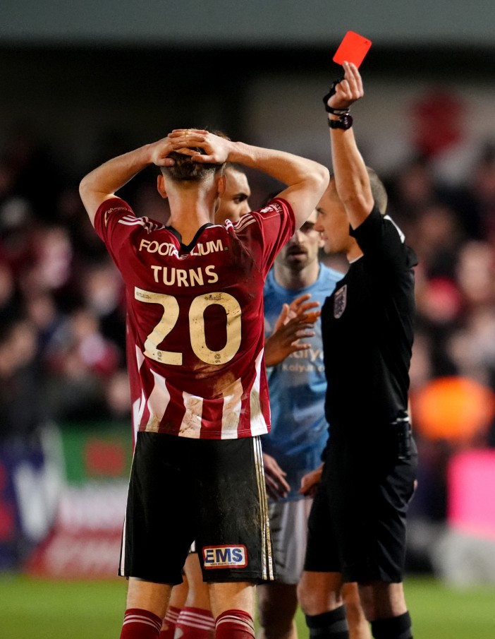 Exeter City's Ed Turns is sent off during the Emirates FA Cup fourth round match at St James Park, Exeter. Picture date: Tuesday February 11, 2025. PA Photo. See PA story SOCCER Exeter. Photo credit should read: Adam Davy/PA Wire. RESTRICTIONS: EDITORIAL USE ONLY No use with unauthorised audio, video, data, fixture lists, club/league logos or "live" services. Online in-match use limited to 120 images, no video emulation. No use in betting, games or single club/league/player publications.