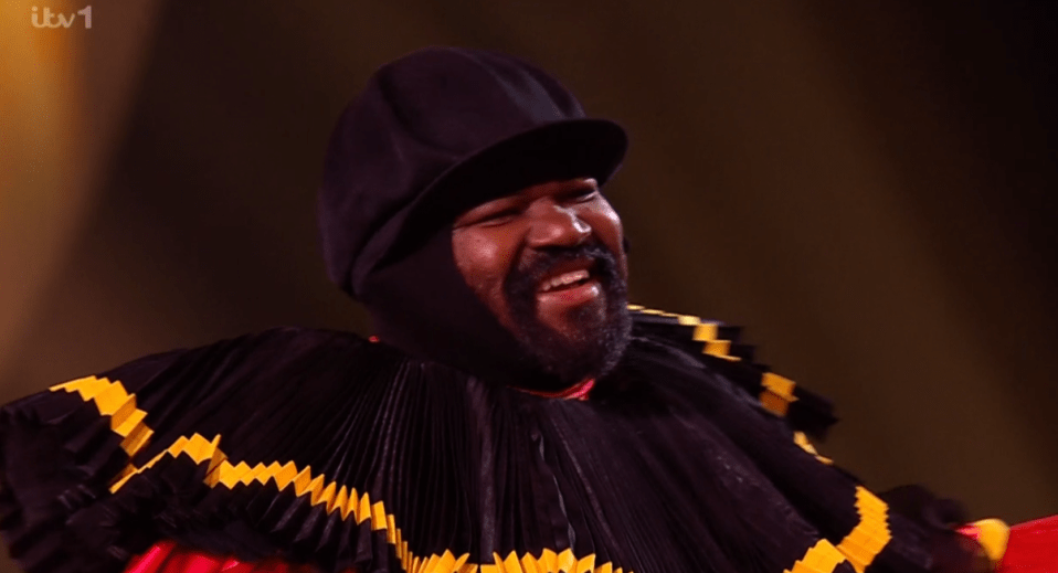 Screenshot of Barry White smiling.