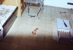 Collage of crime scene photos: interior storage room, blood on the floor, and exterior view of a shop.