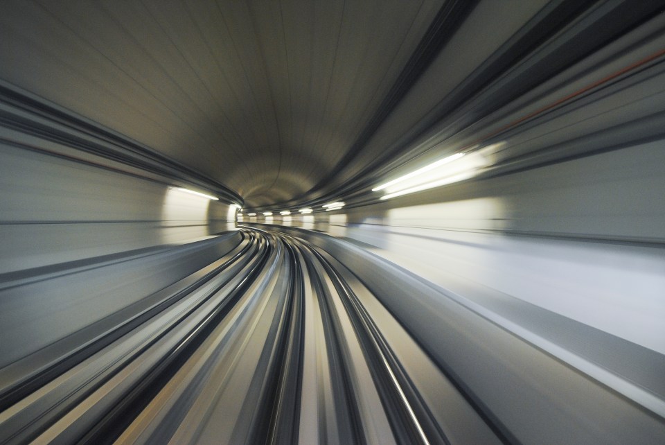 High-speed train traveling through a tunnel.