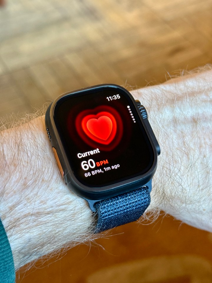 Apple Watch Ultra 2 displaying a heart rate of 60 bpm.