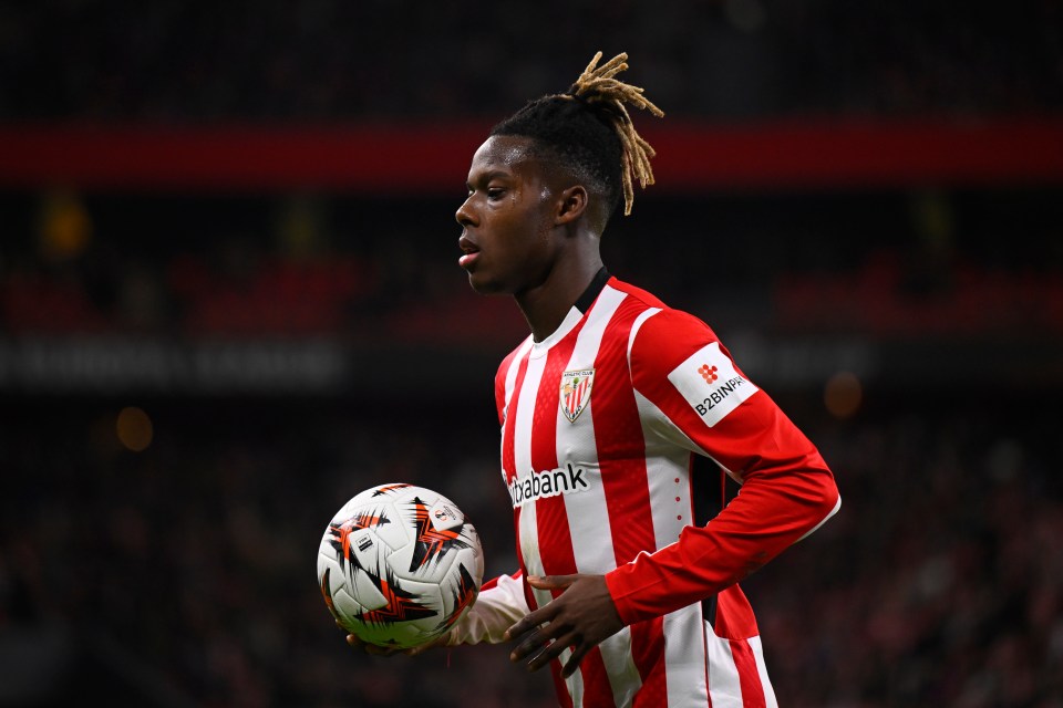 Nico Williams of Athletic Bilbao holding a soccer ball.