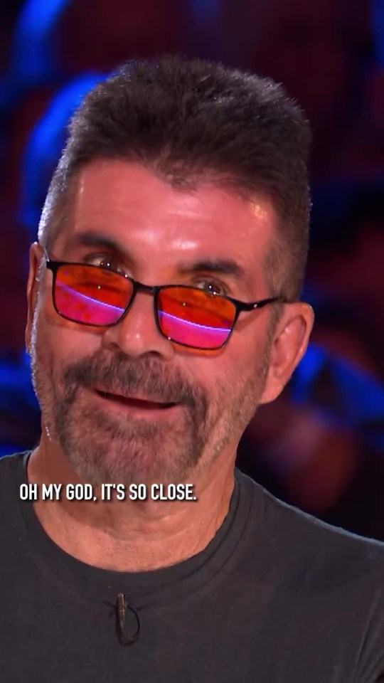 Simon Cowell reacting with the words "Oh my god, it's so close."
