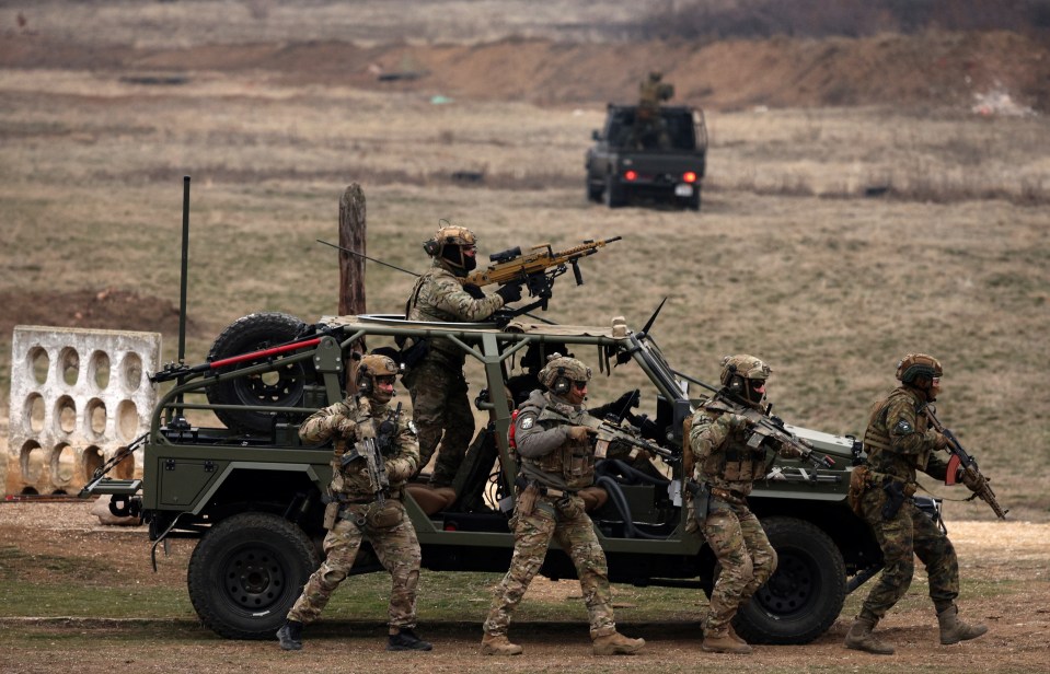Bulgarian and Spanish special forces soldiers participating in a NATO military drill.