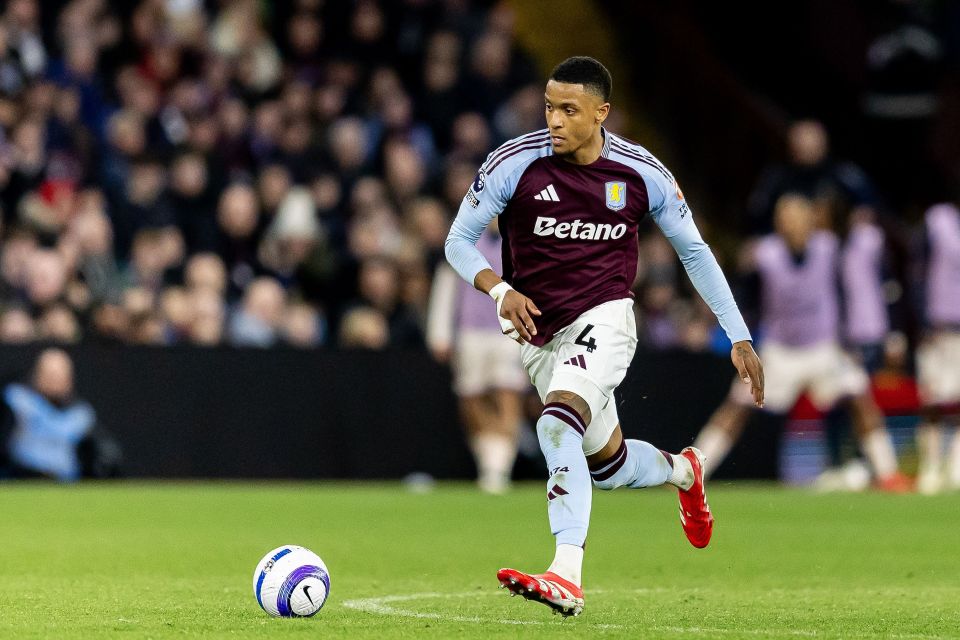 Aston Villa's Ezri Konsa running with the soccer ball.