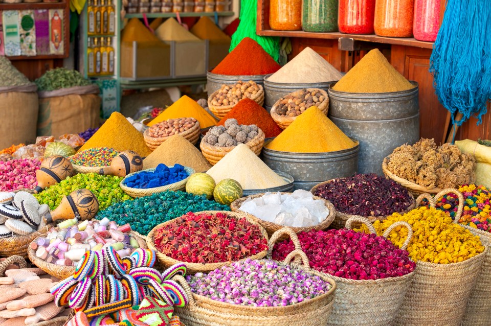 Colorful spices and dyes at a Marrakesh souk.