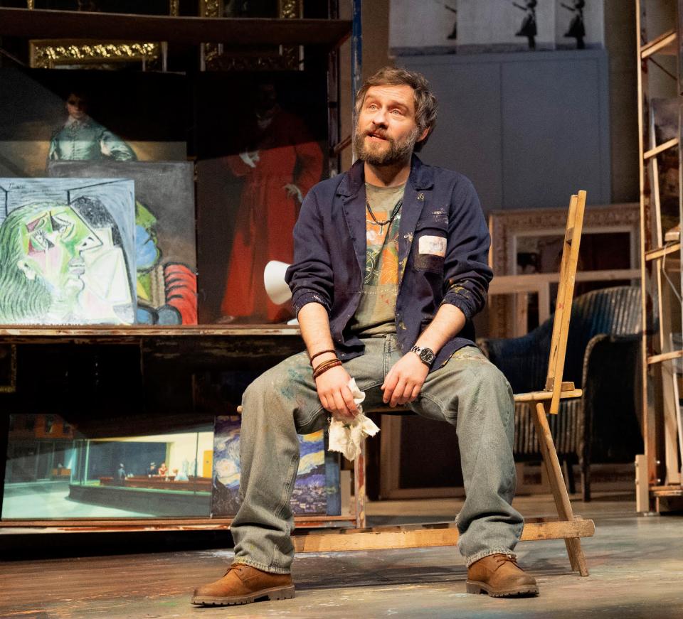 Peter Ash, actor portraying David Hegarty in "Picture You Dead," sits in an artist's studio.