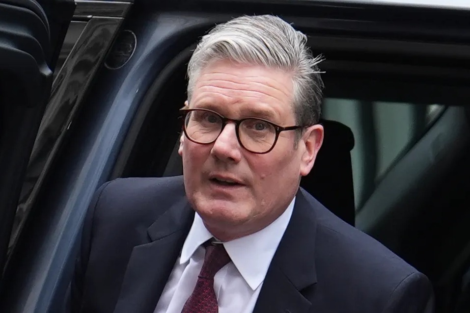 Prime Minister Keir Starmer exiting a car.