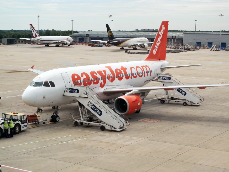 EasyJet plane on the tarmac at an airport.
