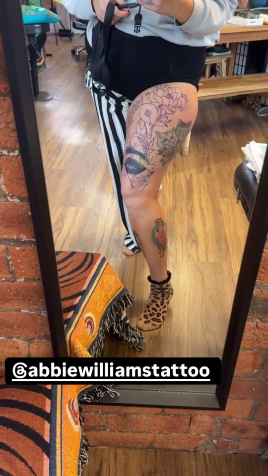Leg with new tattoo in progress.