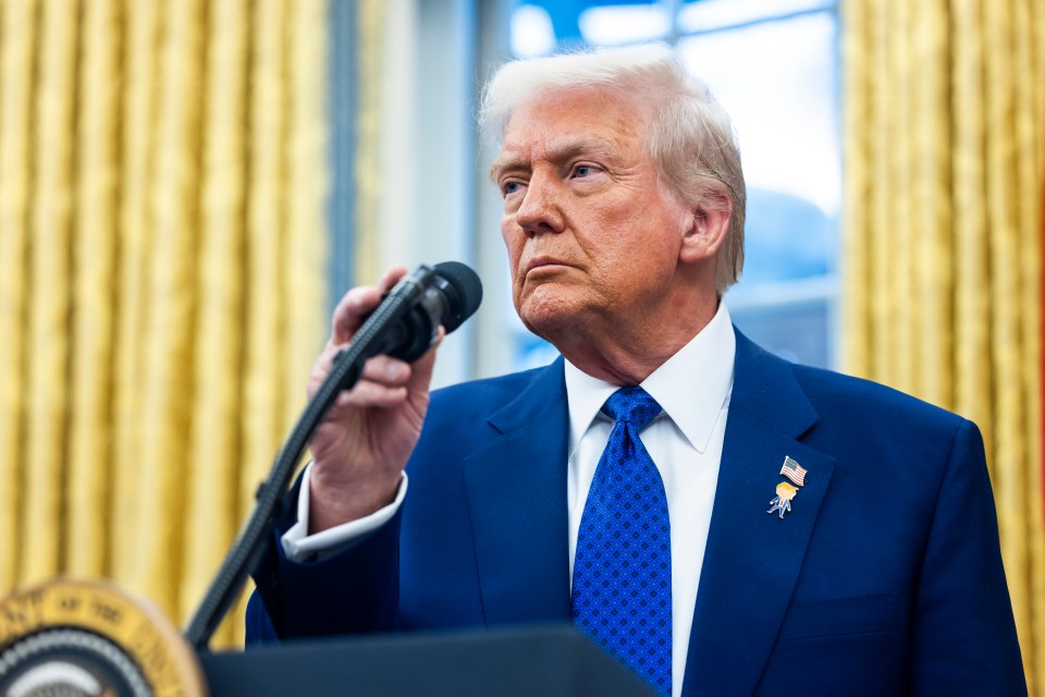 President Trump speaking at a microphone in the Oval Office.