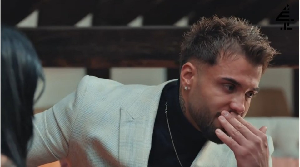 A man crying during a reunion.