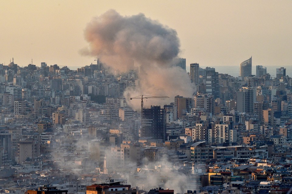 Smoke rises over Beirut following Israeli strikes.