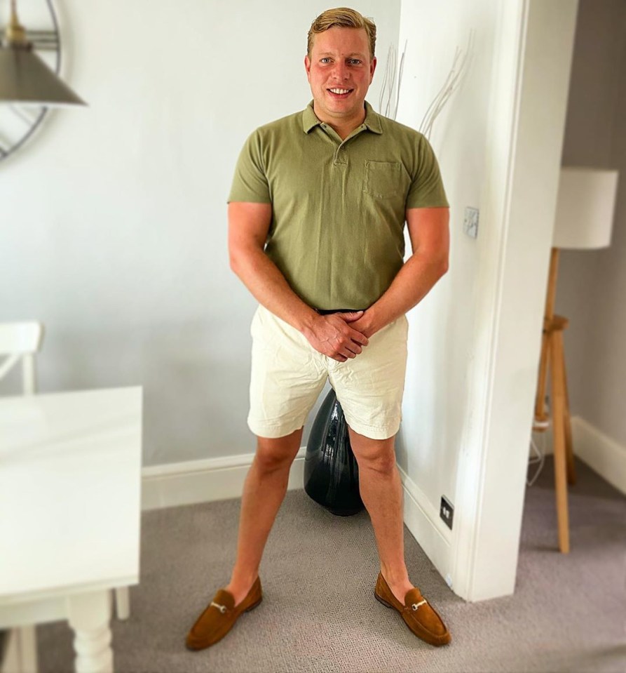 Thomas Skinner standing in his home.